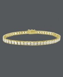 Add an element of luxury to your look with a luminous bracelet. B. Brilliant design features a row of round-cut, channel-set cubic zirconias (10 ct. t.w.) set in 18k gold over sterling silver. Approximate length: 7-1/4 inches. Add an element of luxury to your look with a luminous bracelet. B. Brilliant design features a row of round-cut, channel-set cubic zirconias (10 ct. t.w.) set in 18k gold over sterling silver. Approximate length: 7-1/4 inches.