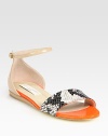 Snake-print upper joins gleaming faux patent leather straps, concluding with an adjustable ankle strap. Faux leather and snake-print faux leather upperPadded insoleImportedOUR FIT MODEL RECOMMENDS ordering true size. 