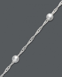 Add a slight touch of shimmer to your look. Giani Bernini's chic Singapore bracelet shines with the addition of beaded accents (5 mm). Crafted in sterling silver. Approximate length: 8 inches. Add a slight touch of shimmer to your look. Giani Bernini's chic Singapore bracelet shines with the addition of beaded accents (5 mm). Crafted in sterling silver. Approximate length: 8 inches.
