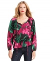 MICHAEL Michael Kors adorned this peasant top with an exotic floral print for a vibrant effect.