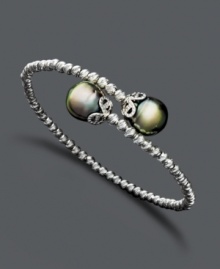 Wrap your wrists with the perfect finishing touch. Elegant bracelet features a unique, wrapped cuff design with cultured Tahitian pearl (9-10 mm) ends and sparkle bead accents. Crafted in sterling silver. Approximate length: 7-1/2 inches. Wrap your wrists with the perfect finishing touch. Elegant bracelet features a unique, wrapped cuff design with cultured Tahitian pearl (9-10 mm) ends and sparkle bead accents. Crafted in sterling silver. Approximate length: 7-1/2 inches.
