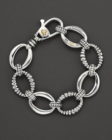 Sterling silver small smooth and fluted oval link bracelet with lobster closure. Designed by Lagos. Sterling silver small smooth and fluted oval link bracelet with lobster closure. Designed by Lagos.
