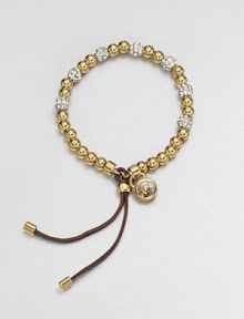 A radiant goldtone beaded design accented with rhinestone encrusted beads and a supple leather closure. Goldtone steel and brassGlass stonesDiameter, about 2.25 adjustableBeaded leather closureImported A radiant goldtone beaded design accented with rhinestone encrusted beads and a supple leather closure. Goldtone steel and brassGlass stonesDiameter, about 2.25 adjustableBeaded leather closureImported