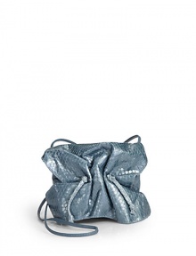 THE LOOKCrossbody strapCinched flapMagnetic tab closure under flapDrawstring topInside logo detailTHE MEASUREMENTCrossbody strap, 32 drop5W X 4H X 2½DTHE MATERIALPythonLeather and printed fabric liningORIGINMade in USA THE LOOKCrossbody strapCinched flapMagnetic tab closure under flapDrawstring topInside logo detailTHE MEASUREMENTCrossbody strap, 32 drop5W X 4H X 2½DTHE MATERIALPythonLeather and printed fabric liningORIGINMade in USA