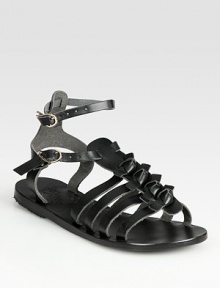 Add a touch of edge to any ensemble with this leather gladiator. finished with adjustable ankle straps. Leather upperLeather lining and soleMade in GreeceOUR FIT MODEL RECOMMENDS ordering true whole size; ½ sizes should order the next whole size up. Add a touch of edge to any ensemble with this leather gladiator. finished with adjustable ankle straps. Leather upperLeather lining and soleMade in GreeceOUR FIT MODEL RECOMMENDS ordering true whole size; ½ sizes should order the next whole size up.