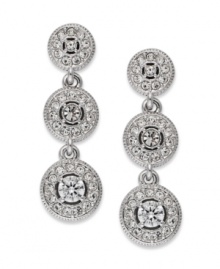 Terrific in triplicate. This pair of three-circle drop earrings from Eliot Danori is crafted from rhodium-plated brass. Crystal and cubic zirconia accents add a lustrous touch. Approximate drop: 1 inch.