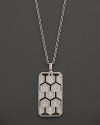 An eye-catching geometric pattern and brilliant diamonds captivate in this sterling silver dog tag necklace from India Hicks.
