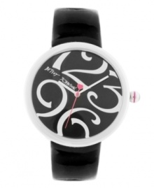 Simple meets over-the-top in that signature Betsey Johnson style. Watch crafted of black leather strap and round silver tone mixed metal case. Black dial features large silver-tone numerals at twelve, three, six and nine o'clock, silver tone hour and minute hands, signature fuchsia second hand with heart and logo. Quartz movement. Water resistant to 30 meters. Two-year limited warranty. Simple meets over-the-top in that signature Betsey Johnson style. Watch crafted of black leather strap and round silver tone mixed metal case. Black dial features large silver-tone numerals at twelve, three, six and nine o'clock, silver tone hour and minute hands, signature fuchsia second hand with heart and logo. Quartz movement. Water resistant to 30 meters. Two-year limited warranty.