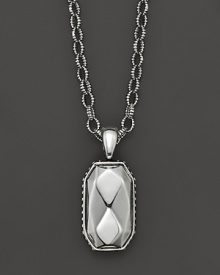 Faceted sterling silver makes a striking statement on a link chain. Faceted sterling silver makes a striking statement on a link chain.