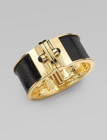 This chic style boasts richly colored, lizard skin inlay with pretty, black onyx stone accents set in 14k goldplated. Lizard skinBlack onyx14k goldplated white metal alloyDiameter, about 2¼Hinged closureMade in USA This chic style boasts richly colored, lizard skin inlay with pretty, black onyx stone accents set in 14k goldplated. Lizard skinBlack onyx14k goldplated white metal alloyDiameter, about 2¼Hinged closureMade in USA