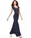 In a hot maxi style, this long BCBGMAXAZRIA striped dress is perfect for looking effortlessly chic day or night!