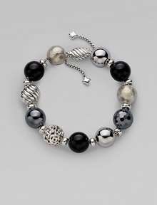 From the Elements Collection. Perfect mix of textures, this beaded design pairs black onyx, hematite and sterling silver.Hematite Black onyx Sterling silver Length, about 7½ Adjustable oval bead clasp Imported From the Elements Collection. Perfect mix of textures, this beaded design pairs black onyx, hematite and sterling silver.Hematite Black onyx Sterling silver Length, about 7½ Adjustable oval bead clasp Imported