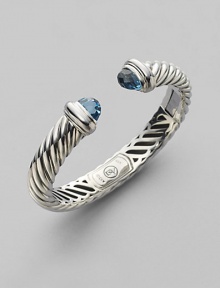 From the Waverly Collection. Cable twisted sterling silver with faceted blue topaz end caps.Blue topaz Sterling silver Width, about 10mm x 5mm Hinge closure Imported From the Waverly Collection. Cable twisted sterling silver with faceted blue topaz end caps.Blue topaz Sterling silver Width, about 10mm x 5mm Hinge closure Imported