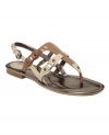 With their contrasting neutrals and studded detail, the Decker flat thong sandals by Tahari put an interesting metallic spin on your look.
