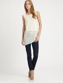Semi-sheer jersey knit layers asymmetrically to create an uneven hem.ScoopneckSleevelessCropped overlayAsymmetrical hemAbout 30 from shoulder to hem75% polyester/25% cottonMachine washImportedModel shown is 5'10 (178cm) wearing US size Small. Semi-sheer jersey knit layers asymmetrically to create an uneven hem.ScoopneckSleevelessCropped overlayAsymmetrical hemAbout 30 from shoulder to hem75% polyester/25% cottonMachine washImportedModel shown is 5'10 (178cm) wearing US size Small.