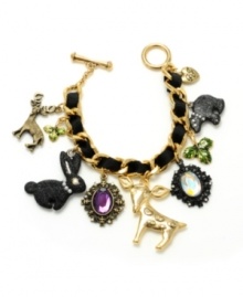 Cute and charming! An adorable array of furry friends from the forest--including a bear, a bunny rabbit and two deer--steal the show on Betsey Johnson's chain link charm bracelet. Along with sparkling crystal medallions, a heart charm and leaf accents, it's further accented by an intertwined grosgrain ribbon. Set in gold tone mixed metal. Approximate length: 7-1/2 inches. Cute and charming! An adorable array of furry friends from the forest--including a bear, a bunny rabbit and two deer--steal the show on Betsey Johnson's chain link charm bracelet. Along with sparkling crystal medallions, a heart charm and leaf accents, it's further accented by an intertwined grosgrain ribbon. Set in gold tone mixed metal. Approximate length: 7-1/2 inches.