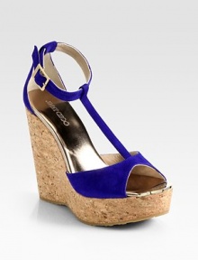 Classic t-strap silhouette of rich suede on a sturdy cork wedge. Cork wedge, 5 (125mm)Cork platform, 1½ (40mm)Compares to a 3½ heel (90mm)Suede upperAdjustable ankle strapLeather liningRubber solePadded insoleMade in Spain Classic t-strap silhouette of rich suede on a sturdy cork wedge. Cork wedge, 5 (125mm)Cork platform, 1½ (40mm)Compares to a 3½ heel (90mm)Suede upperAdjustable ankle strapLeather liningRubber solePadded insoleMade in Spain