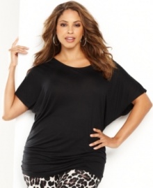 Dramatically full sleeves and a ruched hemlinecreate a captivating look for INC's essential plus size tunic. Dramatically full sleeves and a ruched hemlinecreate a captivating look for INC's essential plus size tunic.