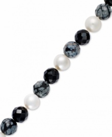 Ebony and ivory. A pretty combination of cultured freshwater pearls (8 mm), onyx (12 mm) and agate (12 mm) adorn this elegant sterling silver strand bracelet. Approximate length: 7 inches. Ebony and ivory. A pretty combination of cultured freshwater pearls (8 mm), onyx (12 mm) and agate (12 mm) adorn this elegant sterling silver strand bracelet. Approximate length: 7 inches.