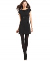 Studio M's ponte-knit dress features simple, sleek styling and a shiny buckle detail at the waist.