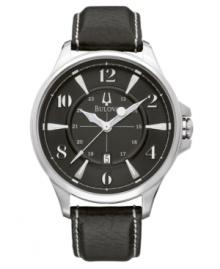 With timeless charm and expert precision, the perfect casual watch from Bulova. Black leather strap with contrast stitch. Silvertone stainless steel round case and round black dial with subdial, date window, logo and numeral indices. Quartz movement. Water resistant to 50 meters. Three-year limited warranty. With timeless charm and expert precision, the perfect casual watch from Bulova. Black leather strap with contrast stitch. Silvertone stainless steel round case and round black dial with subdial, date window, logo and numeral indices. Quartz movement. Water resistant to 50 meters. Three-year limited warranty.