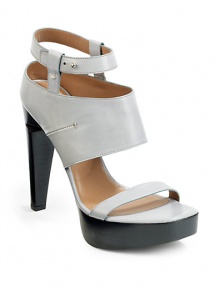 THE LOOKLeather top strapWide ankle cuff with side seamAdjustable ankle strap with stud closurePadded insoleNotched set-under heel, 5 (125mm)Stacked platform, 1 (25mm)Compares to a 4 heel (100mm)THE MATERIALCalf Leather upperLeather liningLeather and rubber soleORIGINMade in Italy THE LOOKLeather top strapWide ankle cuff with side seamAdjustable ankle strap with stud closurePadded insoleNotched set-under heel, 5 (125mm)Stacked platform, 1 (25mm)Compares to a 4 heel (100mm)THE MATERIALCalf Leather upperLeather liningLeather and rubber soleORIGINMade in Italy