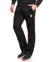 Get inspired to go faster. These Puma Ferrari track pants are the ultimate in motivational gear.