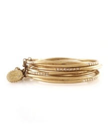 Accent your wrists with one gold bangle, or stack them as high as you please. Perfect the art of layering with these stackable bangles by Jessica Simpson. Each bangle features a row of seven round-cut crystal accents for an extra special touch. Crafted in worn gold tone mixed metal. Bangle set comes with a 3-inch attachment chain. Approximate diameter: 2-3/4 inches. Accent your wrists with one gold bangle, or stack them as high as you please. Perfect the art of layering with these stackable bangles by Jessica Simpson. Each bangle features a row of seven round-cut crystal accents for an extra special touch. Crafted in worn gold tone mixed metal. Bangle set comes with a 3-inch attachment chain. Approximate diameter: 2-3/4 inches.