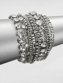 Make a statement in this chunky and sparkly, multi-row design with various link chains punctuated with faceted stones. BrassGlassLength, about 7.5Magnetic closureImported Make a statement in this chunky and sparkly, multi-row design with various link chains punctuated with faceted stones. BrassGlassLength, about 7.5Magnetic closureImported
