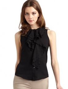 THE LOOKRound necklineFront button closureSleevelessCascading ruffle detailsPleated back yokeTHE FITAbout 23 from shoulder to hemTHE MATERIALVirgin woolCARE & ORIGINDry cleanMade in ItalyModel shown is 5'10½ (179cm) wearing US size 4. THE LOOKRound necklineFront button closureSleevelessCascading ruffle detailsPleated back yokeTHE FITAbout 23 from shoulder to hemTHE MATERIALVirgin woolCARE & ORIGINDry cleanMade in ItalyModel shown is 5'10½ (179cm) wearing US size 4.