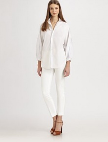 Crisp cotton broadcloth, tailored with romantic blouson sleeves.Point collarButton frontSlightly cropped blouson sleeves with banded button cuffsAbout 24 from natural waistCottonDry cleanMade in USA of Italian fabricModel shown is 5'10 (177cm) wearing US size 4. Crisp cotton broadcloth, tailored with romantic blouson sleeves.Point collarButton frontSlightly cropped blouson sleeves with banded button cuffsAbout 24 from natural waistCottonDry cleanMade in USA of Italian fabricModel shown is 5'10 (177cm) wearing US size 4.