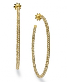 Hoop dreams. Juicy Couture offers these gold tone earrings, crafted from brass, and adorned with glass accents for a touch of glamour. Approximate diameter: 2-1/2 inches. Hoop dreams. Juicy Couture offers these gold tone earrings, crafted from brass, and adorned with glass accents for a touch of glamour. Approximate diameter: 2-1/2 inches.