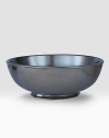 A unique mottling technique lends a hand-thumbed, hammered design to a beautiful metallic pewter serving bowl with the look of an old-world favorite. 2.5-quart capacity 10 diam. Dishwasher, oven and microwave safe Imported
