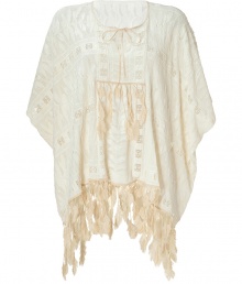 With a 1970s feel, this luxe poncho-style top from Anna Sui has all the right trends of the season -Round neck with tie, dolman sleeves, pintuck front with feather fringe embellishment, all-over lace detailing, feather fringe detailed hem - Wear with cut off jean shorts, platform pumps, and a fringed shoulder bag With a 1970s feel, this luxe poncho-style top from Anna Sui has all the right trends of the season -Round neck with tie, dolman sleeves, pintuck front with feather fringe embellishment, all-over lace detailing, feather fringe detailed hem - Wear with cut off jean shorts, platform pumps, and a fringed shoulder bag
