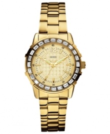 A classic, menswear-inspired watch from GUESS with feminine details. A classic, menswear-inspired watch from GUESS with feminine details.