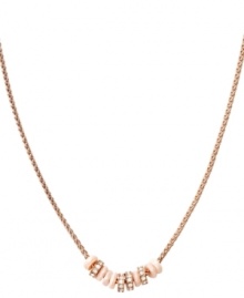 Naturally neutral. Peach shells and clear crystals combine in this breezy style by Fossil. Crafted in rose gold tone mixed metal. Approximate length: 18 inches + 2-inch extender. Naturally neutral. Peach shells and clear crystals combine in this breezy style by Fossil. Crafted in rose gold tone mixed metal. Approximate length: 18 inches + 2-inch extender.