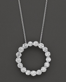 A gorgeous round diamond pendant set in white gold, crafted from a series of brilliant round stones. A gorgeous round diamond pendant set in white gold, crafted from a series of brilliant round stones.