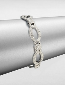 A graceful design featuring links in various shapes accented in pavé crystals. CrystalsRhodium-plated brassLength, about 7.5Box and tongue closureImported A graceful design featuring links in various shapes accented in pavé crystals. CrystalsRhodium-plated brassLength, about 7.5Box and tongue closureImported