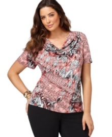 A draped neckline lends an chic finish to Elementz' short sleeve plus size top, featuring a vibrant print. (Clearance) A draped neckline lends an chic finish to Elementz' short sleeve plus size top, featuring a vibrant print. (Clearance)
