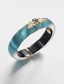 From the Lucite Teatro Modern Collection. A striking bangle of hand-sculpted, hand-painted Lucite is embellished with an Art Deco cluster of dazzling faceted Swarovski crystals.CrystalGoldtone and hematiteLuciteDiameter, about 2.25Width, about .25Hinged, with magnetic closureMade in USA From the Lucite Teatro Modern Collection. A striking bangle of hand-sculpted, hand-painted Lucite is embellished with an Art Deco cluster of dazzling faceted Swarovski crystals.CrystalGoldtone and hematiteLuciteDiameter, about 2.25Width, about .25Hinged, with magnetic closureMade in USA