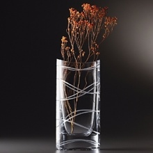 The Pocket Vase is really shaped like a shirt pocket. Swirling ribbons suggest you might use this vase for more than just flowers. Try marbles, soap beads or a handkerchief. The Pocket Vase is really shaped like a shirt pocket. Swirling ribbons suggest you might use this vase for more than just flowers. Try marbles, soap beads or a handkerchief.