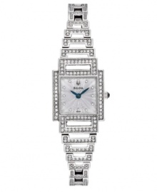 Outshine the brightest stars with this glittering watch by Bulova. Stainless steel bracelet and square case embellished with crystal accents. Stamped silver tone dial features crystal accent markers, two royal blue hands and logo at twelve o'clock. Quartz movement. Water resistant to 30 meters. Three-year limited warranty. Outshine the brightest stars with this glittering watch by Bulova. Stainless steel bracelet and square case embellished with crystal accents. Stamped silver tone dial features crystal accent markers, two royal blue hands and logo at twelve o'clock. Quartz movement. Water resistant to 30 meters. Three-year limited warranty.