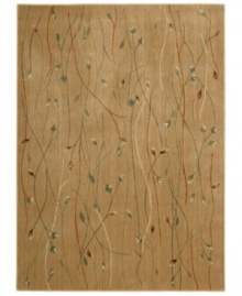 With a flowing floral motif, this area rug offers an organic appeal to your decor. Vines intertwine over an earthy gold background, each branch hand-carved to add that extra dimension and eye-pleasing interest. With a flowing floral motif, this area rug offers an organic appeal to your decor. Vines intertwine over an earthy gold background, each branch hand-carved to add that extra dimension and eye-pleasing interest.