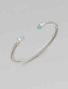 From the Cable Collection. A signature cable design with pretty aqua chalcedony caps accented in sparkling diamonds. Aqua chalcedonyDiamonds, .2 tcwSterling silverDiameter, about 2½Slip-on styleImported From the Cable Collection. A signature cable design with pretty aqua chalcedony caps accented in sparkling diamonds. Aqua chalcedonyDiamonds, .2 tcwSterling silverDiameter, about 2½Slip-on styleImported