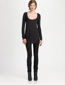 From the HELMUT capsule collection. Lengthy shirttail hem and a plunging scoopneck amplify this supremely soft tee. ScoopneckLong sleevesShirttail hem hits below the hips80% modal/20% nylonDry cleanMade in USA of imported fabricModel shown is 5'10 (177cm) wearing US size Small. From the HELMUT capsule collection. Lengthy shirttail hem and a plunging scoopneck amplify this supremely soft tee. ScoopneckLong sleevesShirttail hem hits below the hips80% modal/20% nylonDry cleanMade in USA of imported fabricModel shown is 5'10 (177cm) wearing US size Small.