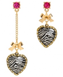 The fiercest of fashionistas. Betsey Johnson's mismatch earrings combine wild zebra stripes with 80s-influenced design. Crafted in gold tone mixed metal with bow accents and hot pink crystals. Approximate drops: 1-3/4 inches and 3 inches. The fiercest of fashionistas. Betsey Johnson's mismatch earrings combine wild zebra stripes with 80s-influenced design. Crafted in gold tone mixed metal with bow accents and hot pink crystals. Approximate drops: 1-3/4 inches and 3 inches.