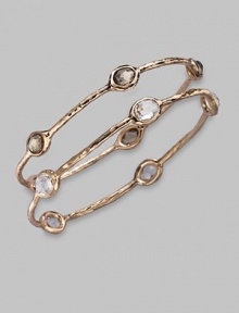 Five faceted ovals of softly colored smokey quartz sit within a hammered bangle of 18k gold and sterling silver with a glowing finish of 18k rose goldplating. Smoky quartz An alloy of 18K gold and sterling silver plated with 18K rose gold Diameter, about 2¾ Imported Please note: Bracelets sold separately. Five faceted ovals of softly colored smokey quartz sit within a hammered bangle of 18k gold and sterling silver with a glowing finish of 18k rose goldplating. Smoky quartz An alloy of 18K gold and sterling silver plated with 18K rose gold Diameter, about 2¾ Imported Please note: Bracelets sold separately.