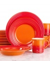 The dinnerware set that has it all. Crafted for durability and ease of use but with a brilliant enamel finish to redefine the table, Le Creuset place settings lend smart, enduring style to everyday dining. Featuring a three-ring design in vibrant flame.