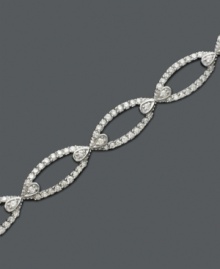 Decadent diamonds with a vintage inspired spin. This sparkling bracelet features round-cut diamond (2 ct. t.w.) in a 14k white gold setting. Approximate length: 7-1/4 inches. Decadent diamonds with a vintage inspired spin. This sparkling bracelet features round-cut diamond (2 ct. t.w.) in a 14k white gold setting. Approximate length: 7-1/4 inches.