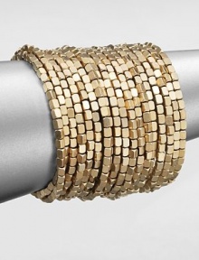 Satin finished, goldtone beading makes a dramatic statement in this coil wrap design.Brass Diameter, about 2½ Imported 